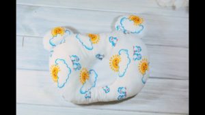 Подушка для новорожденного в форме мишки.